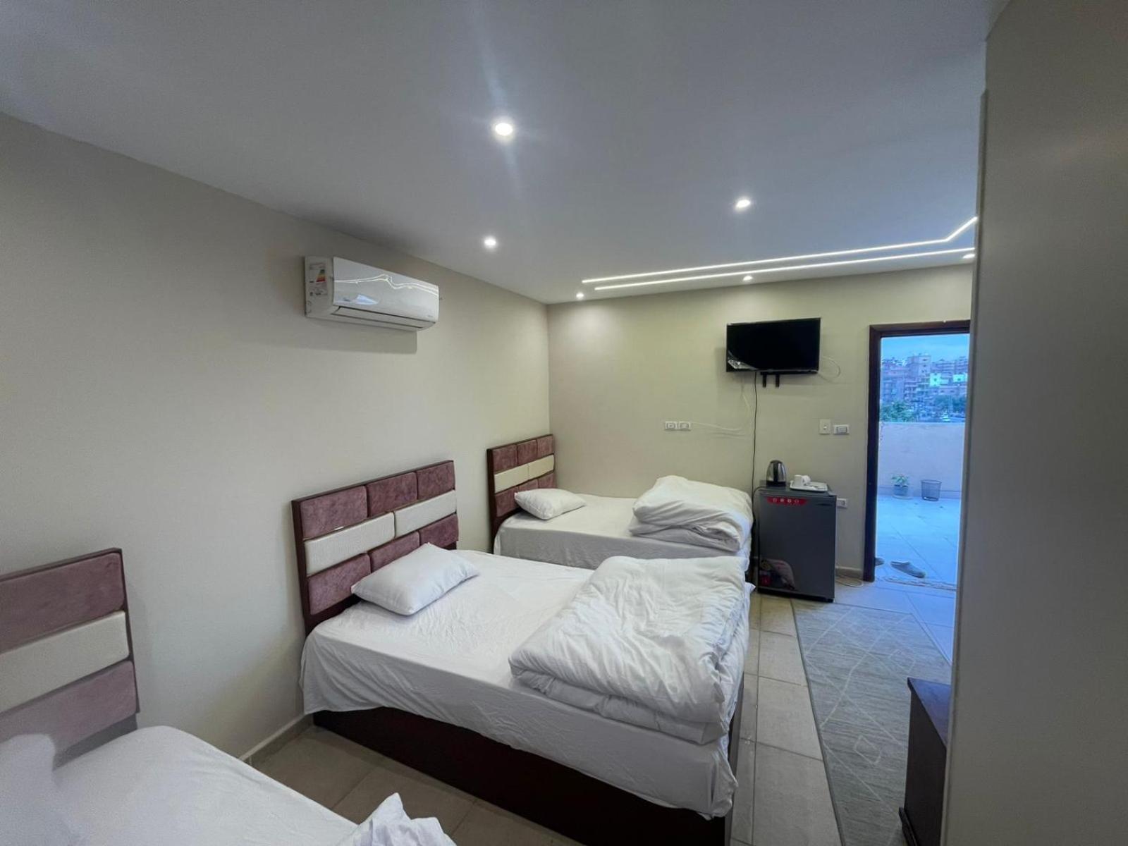Sami Holiday Inn - Pyramids View Rooftop Al Kawm al Akhdar Buitenkant foto